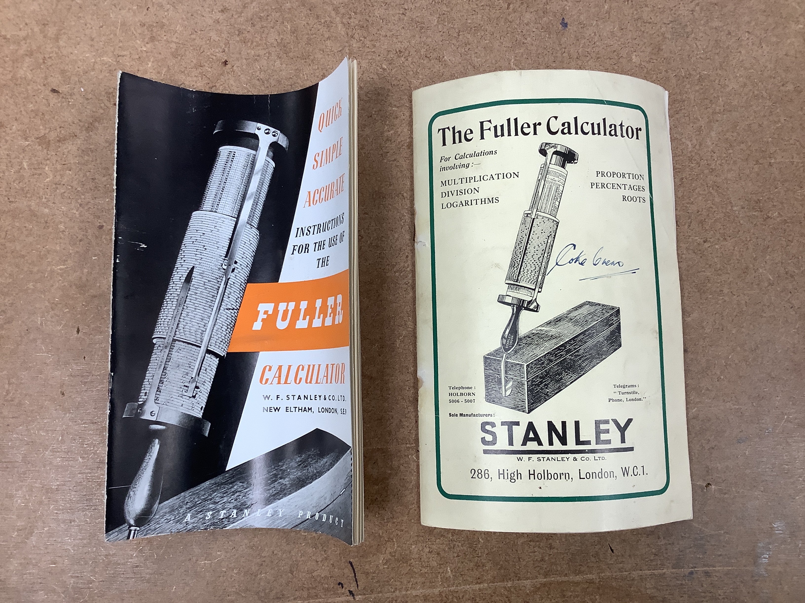 A teak cased Stanley Fuller calculator with instruction booklet, case 45.5cm